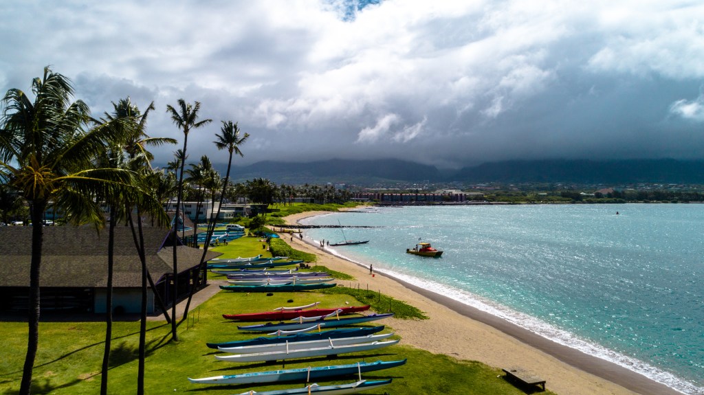 Paddling boats on the Hawaiʻi shoreline
